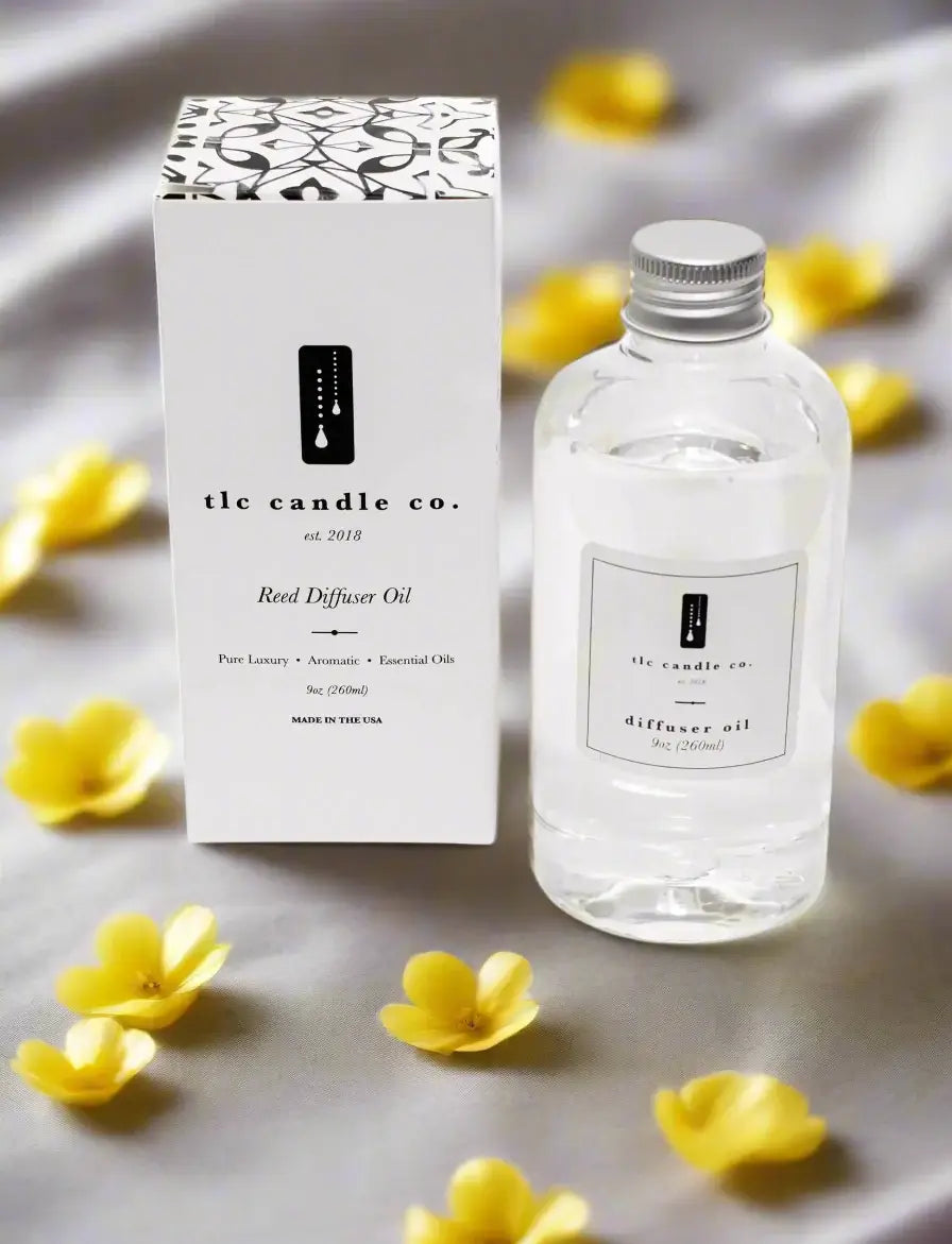 TLC Candle Co. Reed Diffuser Oil bottle with floral accents on a soft background, perfect for creating a soothing atmosphere.